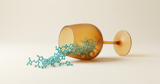 Matte 3D amber wine glass tipped on its side with teal histamine molecules spilling out